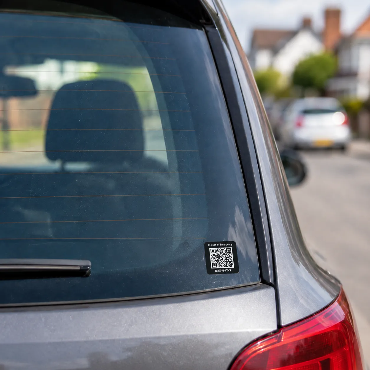 ICE Jar QR code sticker on a car rear window